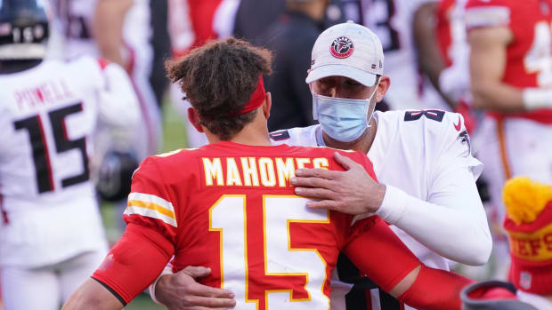 Dec 27, 2020; Kansas City, MO, USA; Kansas City Chiefs quarterback Patrick Mahomes (15) greets Atlanta Falcons quarterback Matt Ryan (2) after the game at Arrowhead Stadium. Mandatory Credit: Denny Medley-USA TODAY Sports